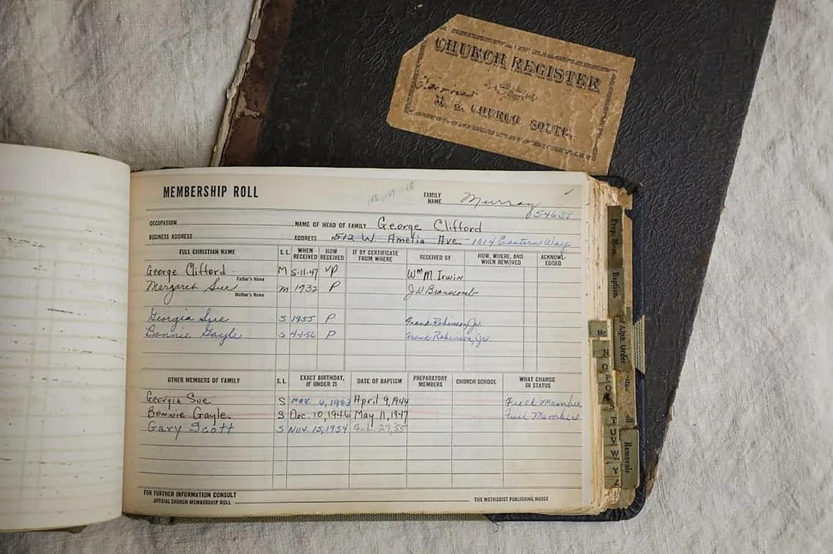 A vintage handwritten record book, the V5C document reference number changes each time DVLA issues a new logbook.