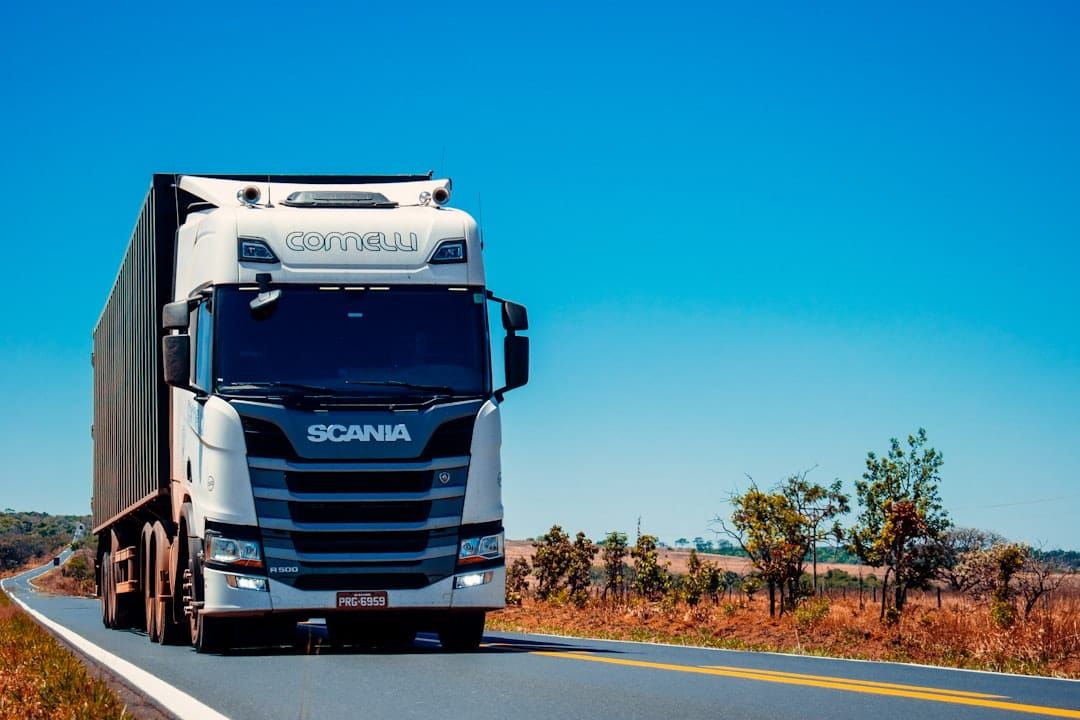A UK driver's log book — modern digital tachograph cards have largely replaced paper records, but some operators still use both.