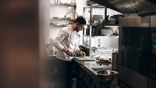 A UK commercial kitchen — UK food businesses must retain HACCP and food safety records on a tiered schedule by record type.