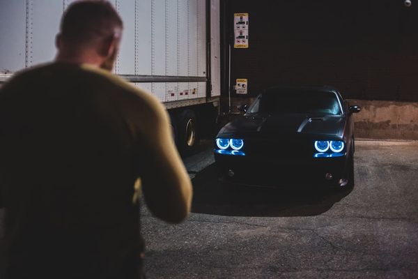 A UK driver checking documents — stolen V5C logbooks are used to clone identity for stolen vehicles. Warning signs to spot.