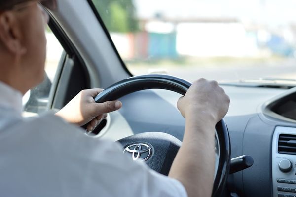 A UK HGV driver — the 56-hour weekly driving limit is the cornerstone of EU 561/2006 enforced by DVSA.