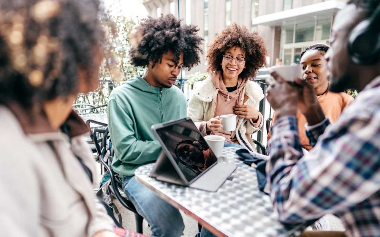 students at a coffee table