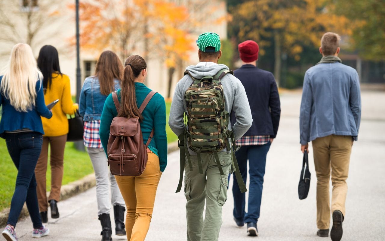 students walking on college campus