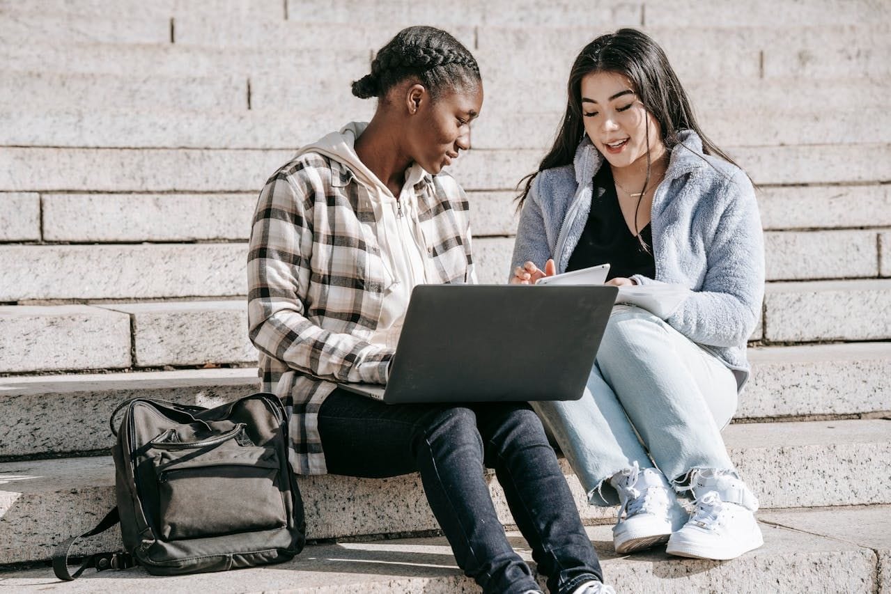 students on campus steps