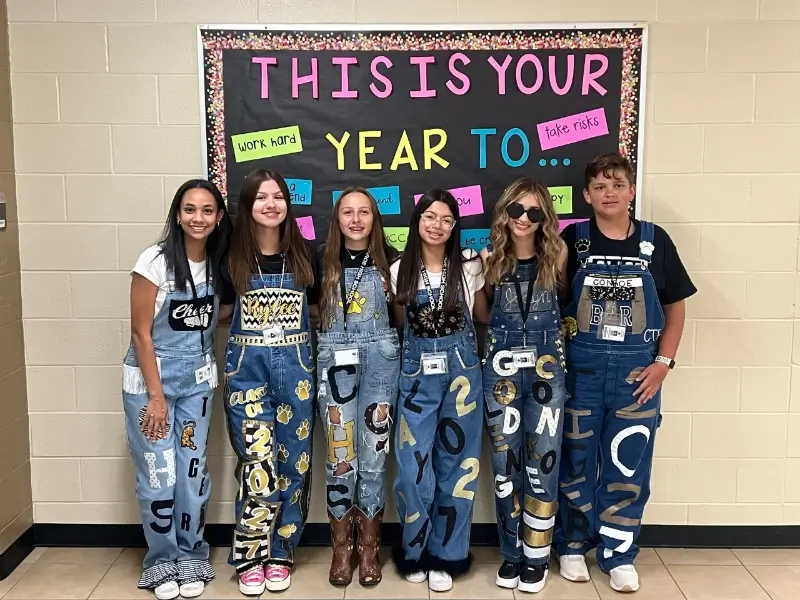 senior year high school students in overalls