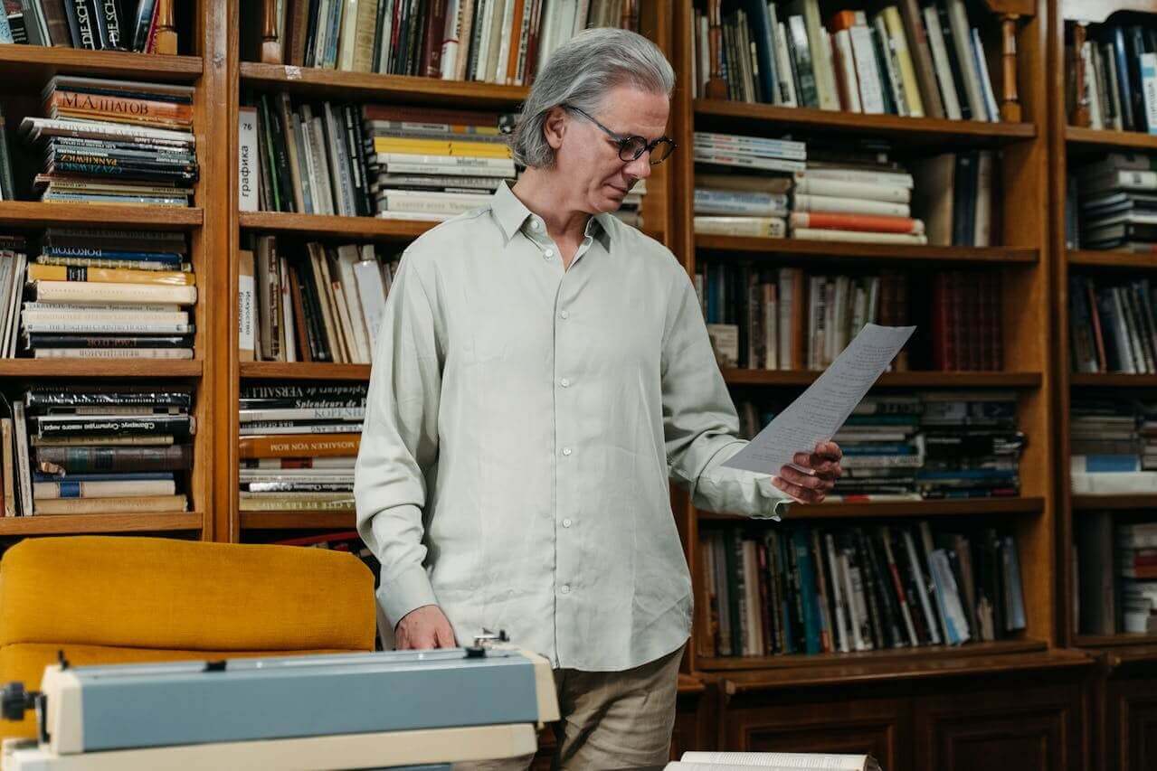 professor looks at student reviews and evaluations