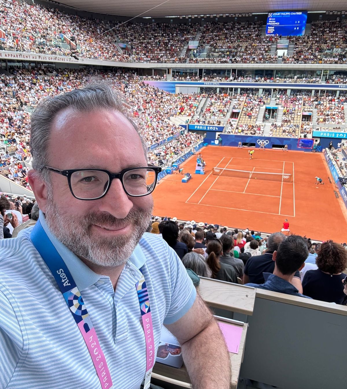 The author at the 2024 Olympic Summer Games in Paris, covering what ended up being the final singles victory of Rafael Nadal's career.