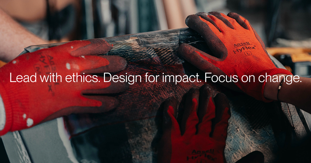 Hands in red work gloves shaping recycled textile material - RK Collective product design studio, Sydney.