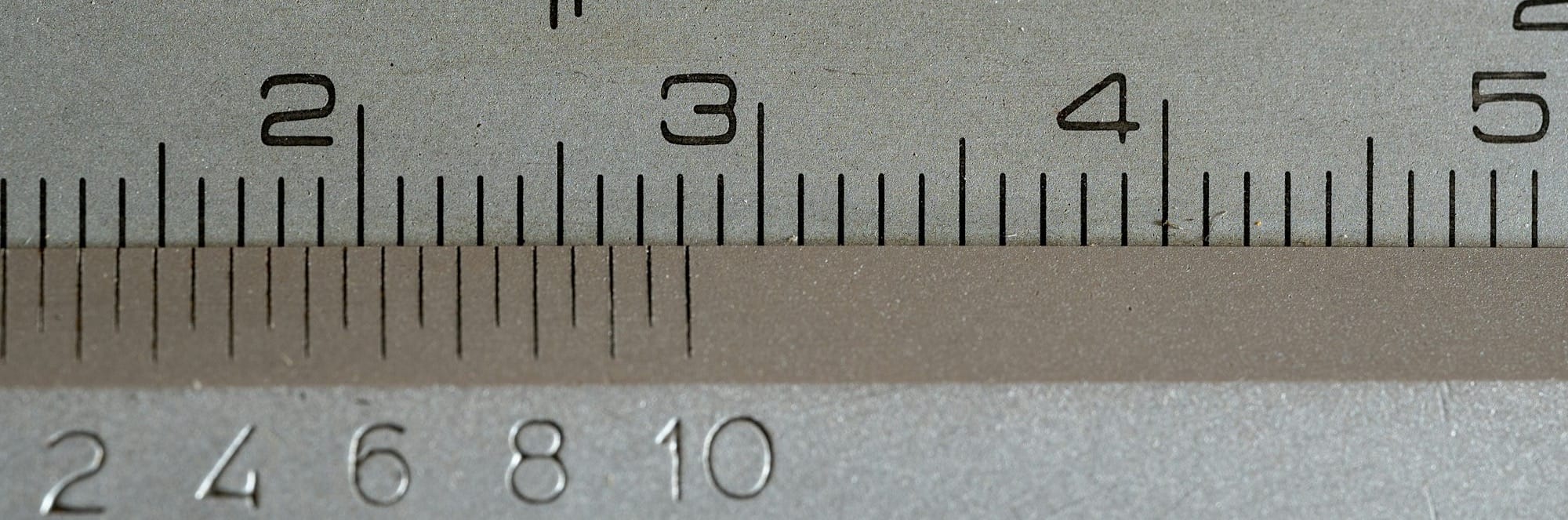 a close up of a measuring tape with numbers on it