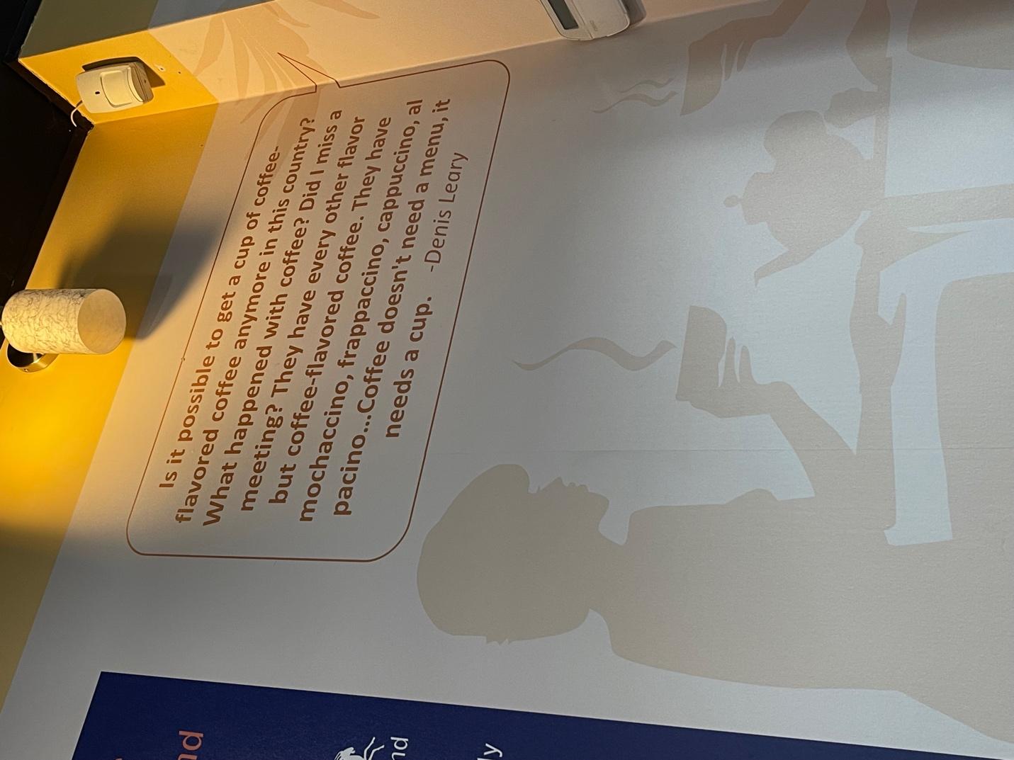 A poster on a wall

Description automatically generated