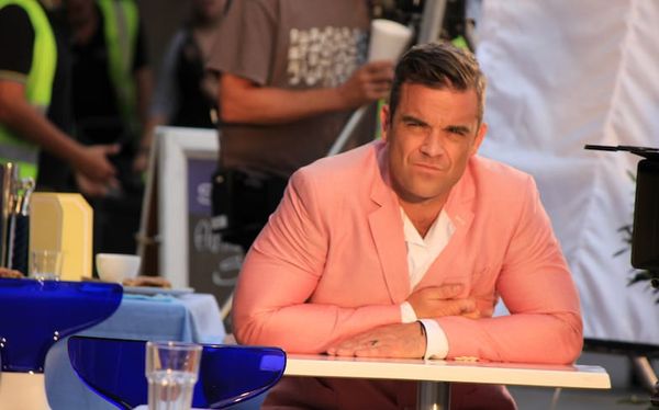 Robbie Williams draws criticism after asking transgender X Factor contestant about their birth name