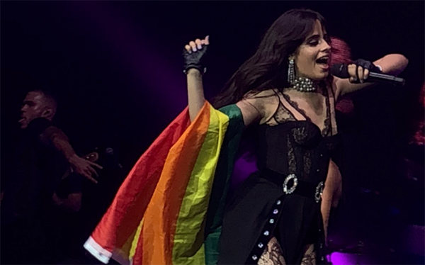 Camila Cabello waves rainbow flag during London show