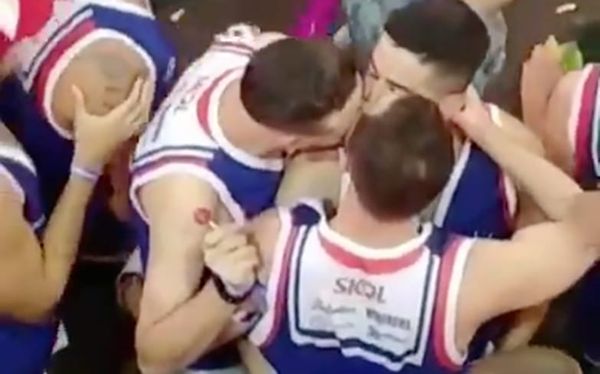 These athletes are bonding with a hot three-way makeout session