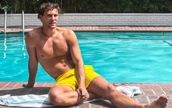 Cooper Koch serves “poolside heat” in viral photos