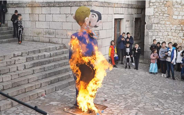 Croatian town cheers and dances after setting fire to effigy of gay couple