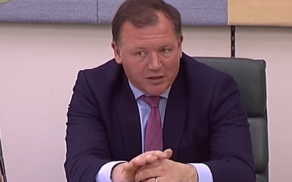 Conservative MP Damian Collins is planning to make homophobic chanting illegal at football matches