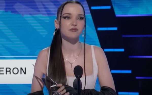 Dove Cameron pays tribute to Club Q shooting victims during the 2022 AMAs