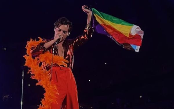 Fans go wild as Harry Styles flies Pride flag wearing Elton John-inspired outfit
