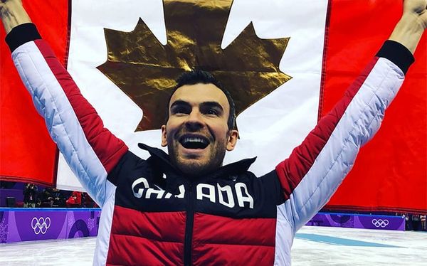 Eric Radford becomes first openly gay man to win gold at Winter Olympics