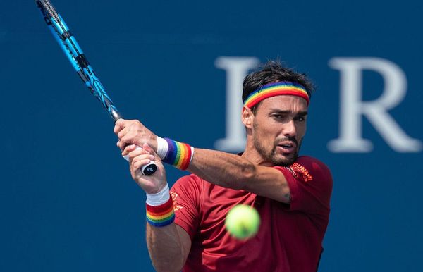 Tennis player who used anti-LGBTQ+ slur in Tokyo returns to court in rainbow gear