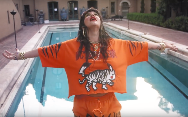 Kesha unveils psychedelic video for High Road title track