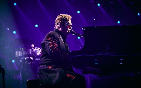 Elton John postpones final tour due to “considerable pain” from hip injury