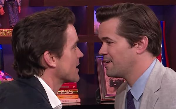 Matt Bomer and Andrew Rannells share a kiss on Watch What Happens Live