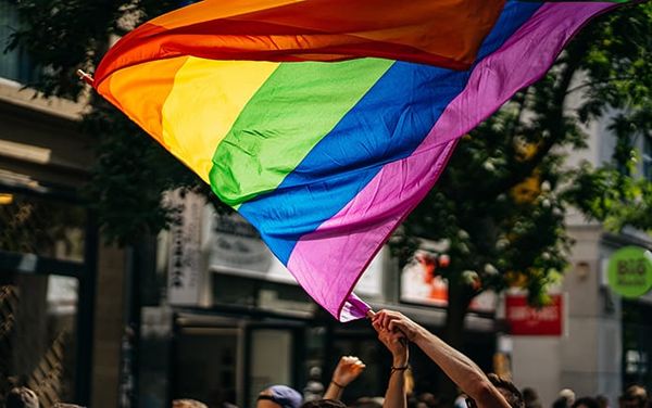 Trans teacher removed from primary school over “safety concerns” after Pride flag set alight
