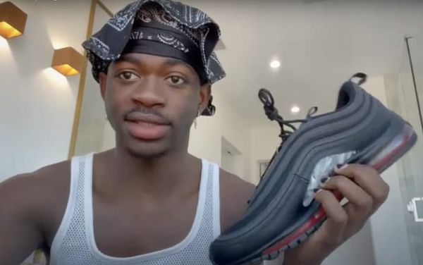 Lil Nas X hits back at critics with new “apology” video for his Satan Shoes