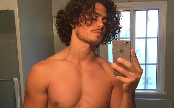 Riverdale star opens up about his “experience with a man”