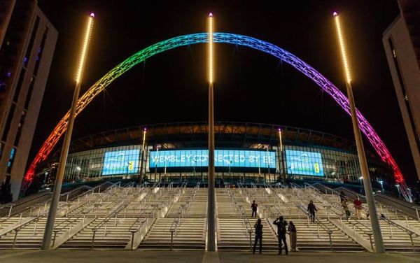 Wembley Stadium lit up in rainbow colours in response to FIFA’s OneLove armband ban