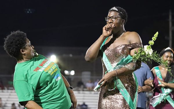 Gay high school teen crowned homecoming royalty in stunning gold dress