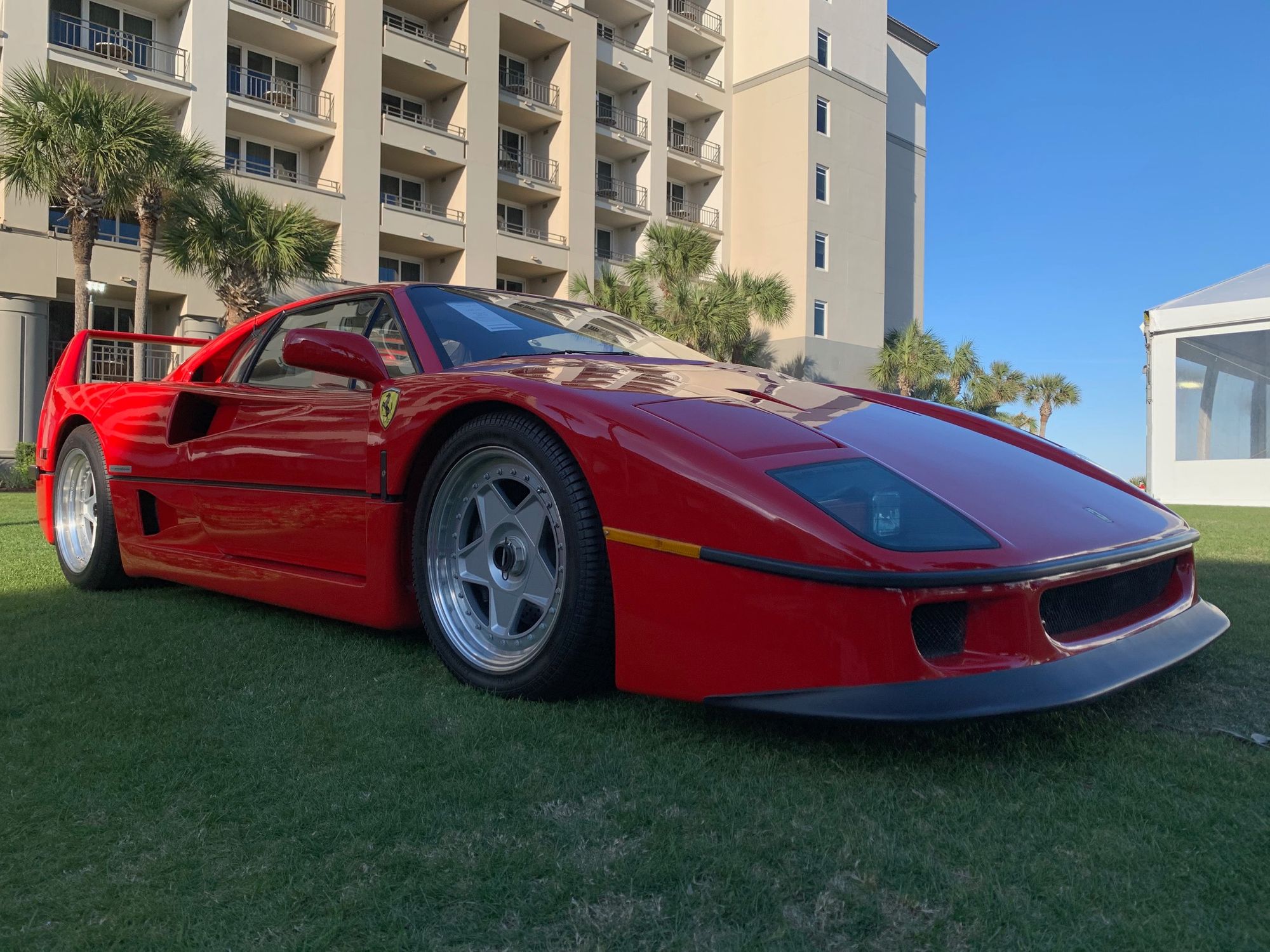 <img src="ferrari.jpg" alt="A Ferrari F40 at Amelia Island">