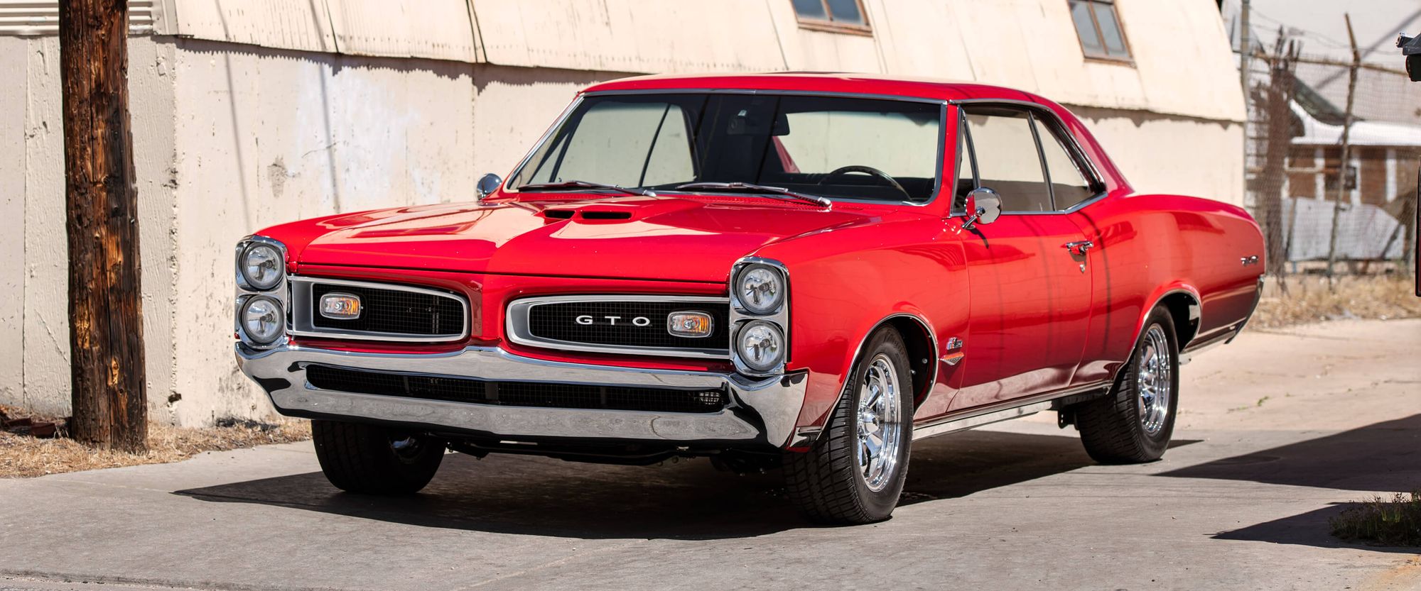 <img src="1966-pontiac-gto-2.jpg" alt="A meticulously restored 1966 Pontiac GTO">