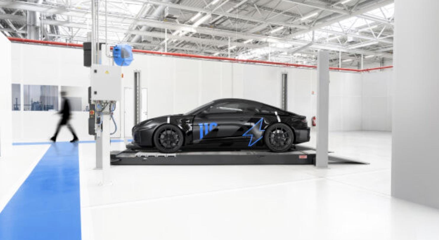 Camouflaged Alpine A110 FUTURE development mule on a test rig inside Alpine's facility