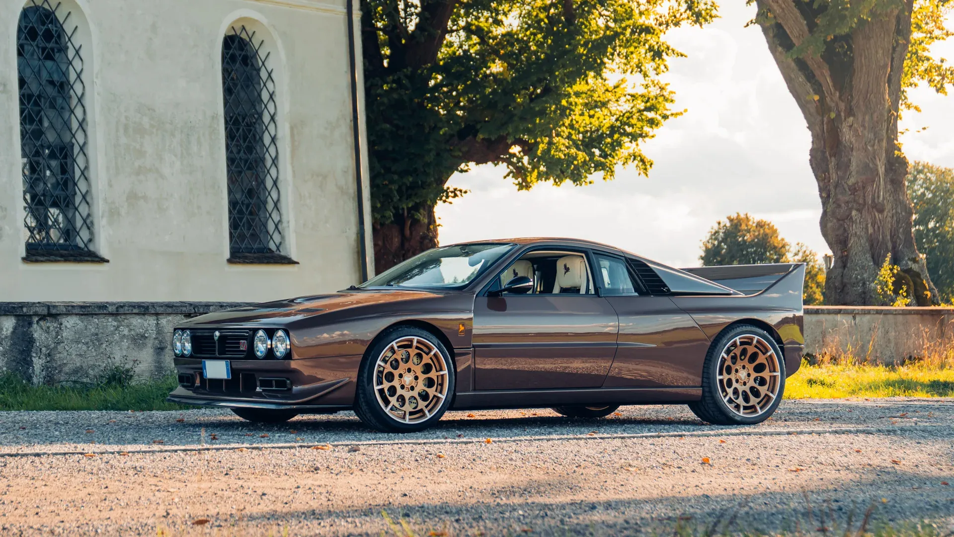 1976 Lancia Kimera EVO37 in Luci del Bosco brown with gold wheels
