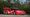 1982 Porsche 935/84 race car driven by Bob Akin, red Coca-Cola and Domino's Pizza livery, No. 5