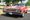 Orange 1967 Chevrolet Chevelle Malibu Sport Coupe with white stripes, front three-quarter view
