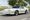 White 1988 Pontiac Firebird Trans Am GTA Notchback with gold diamond-spoke wheels, front three-quarter view