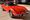 1972 Opel GT in Fire Glow orange parked in a driveway in Austin, Texas