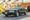 Deep Emerald Green 1990 Ford Mustang LX 5.0 7-Up Edition convertible with white top
