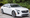 White 2019 Cadillac CT6-V sedan with Blackwing twin-turbo V8 parked in front of green foliage