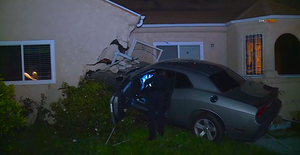 Most Outrageous Of 2020: Dodge Challenger Becomes Uninvited House Guest