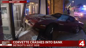 Corvette Crashes Into Bank