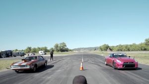 Nissan GT-R Races 1967 Camaro