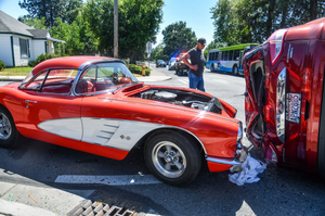 Little Wrecked Corvette Gets Clipped By Rollaway SUV