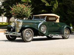 1931 Duesenberg Model J Roadster Speeds Onto Stage For An Auction