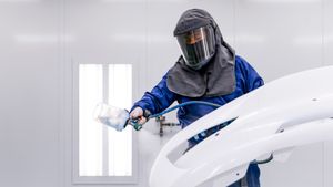 Tesla Accused Of Painting Over Body Cracks