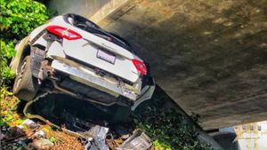 Man Wedges Maserati Under Highway While Running From The Cops