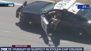 Man Jumps From Stolen Police Charger